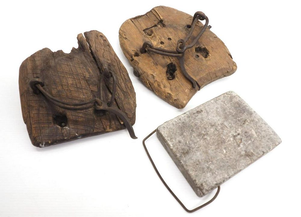 Lot 631: (2) Wooden horse muck shoes / soap stone