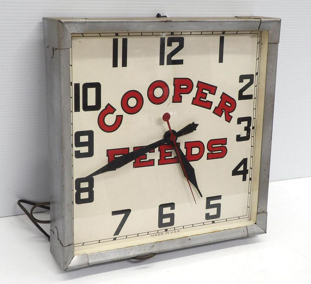 Lot 641: Cooper Feeds clock