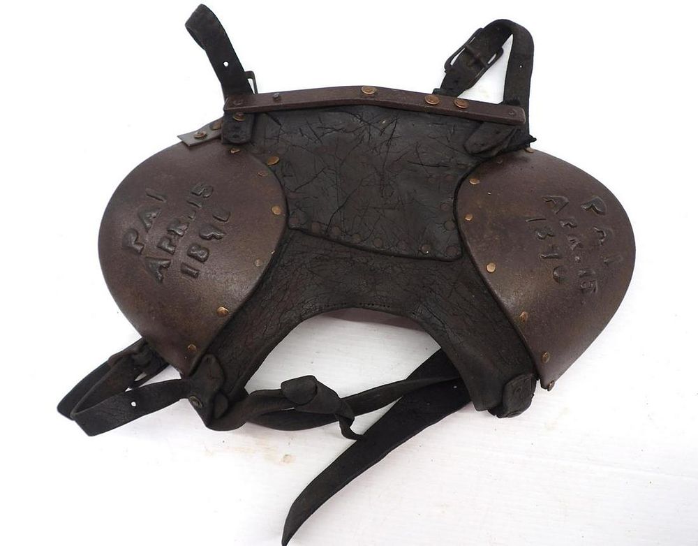 Lot 647: Very early leather & cast iron bull blinds