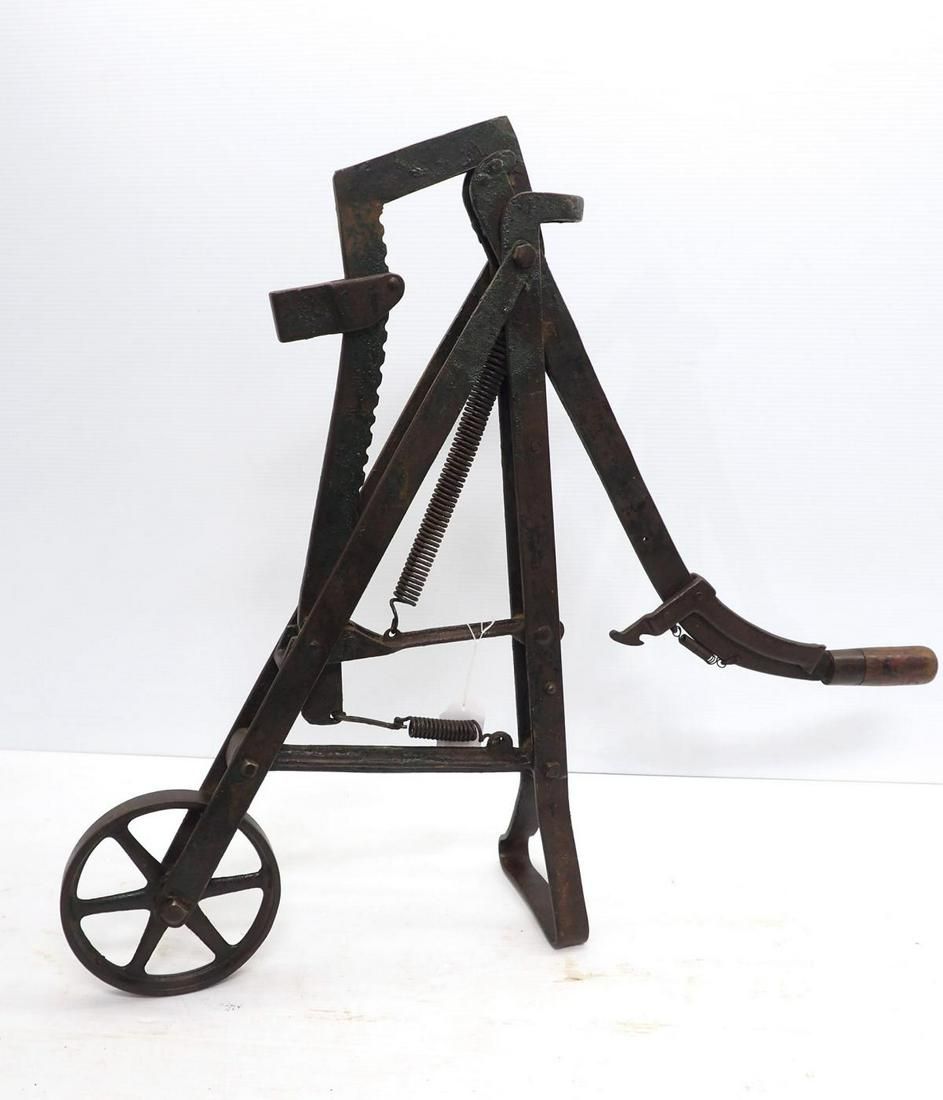 Lot 671: Very unusual cast iron buggy jack