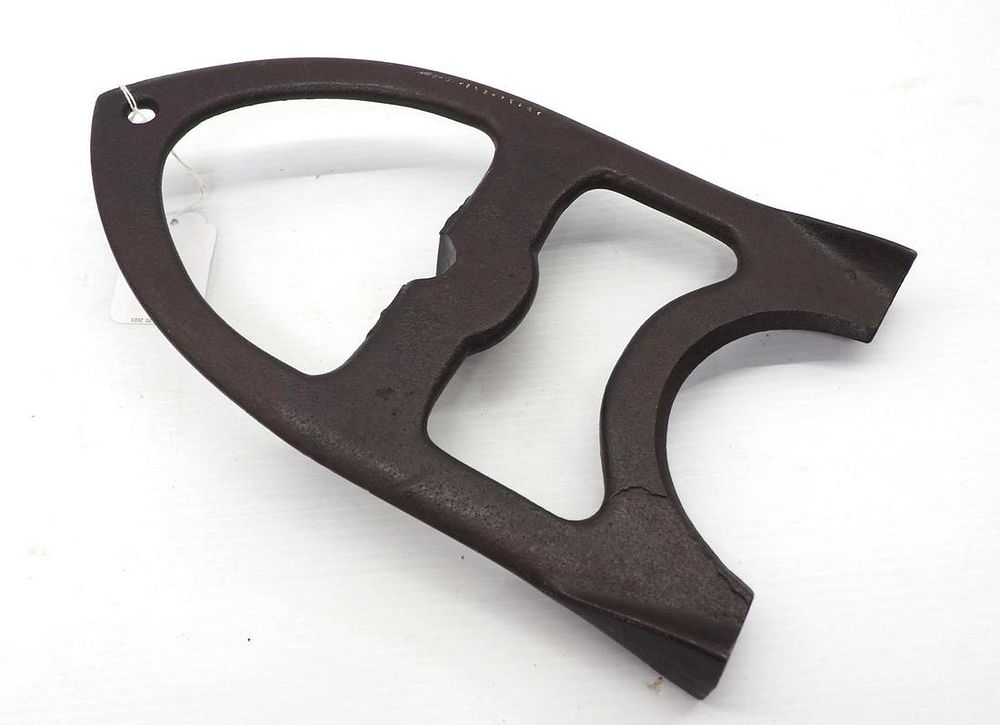 Lot 677: Cast iron row marker marked "E55"