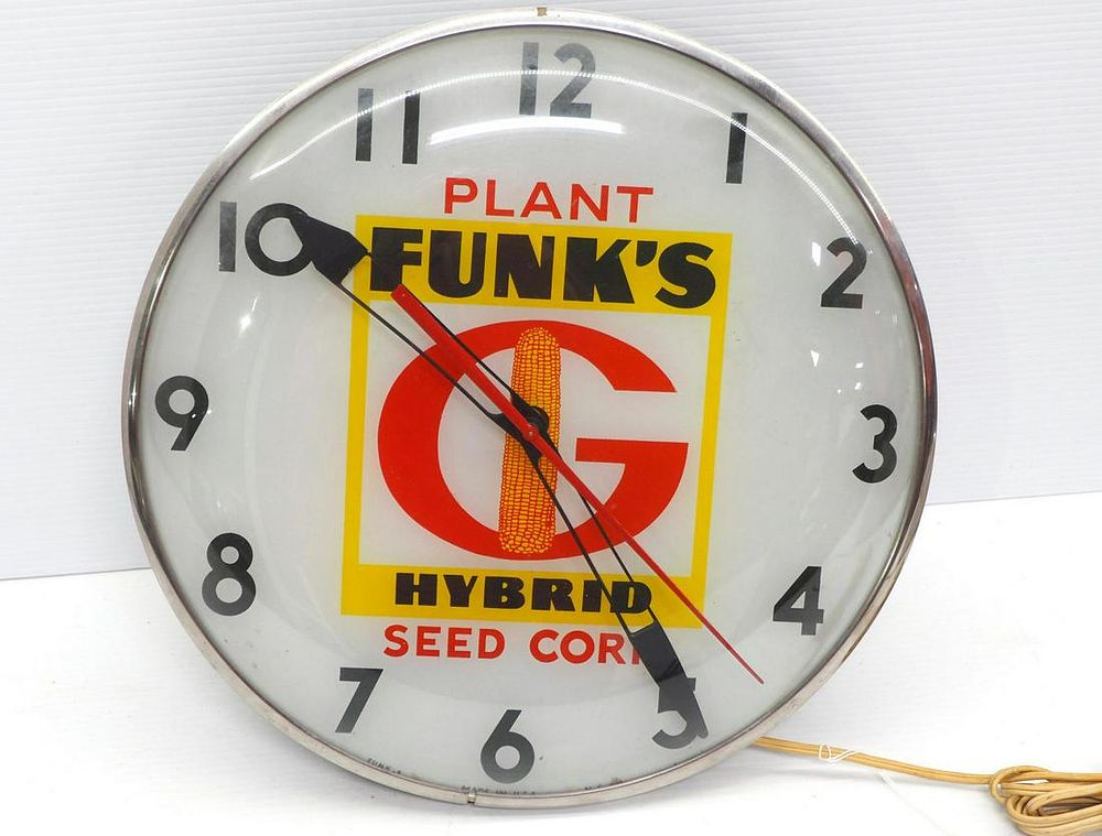 Lot 689: Funks Hybrid Seed Corn clock