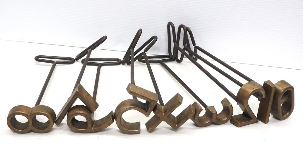 Lot 713: (9) Nasco Fort Atkins brass branding set