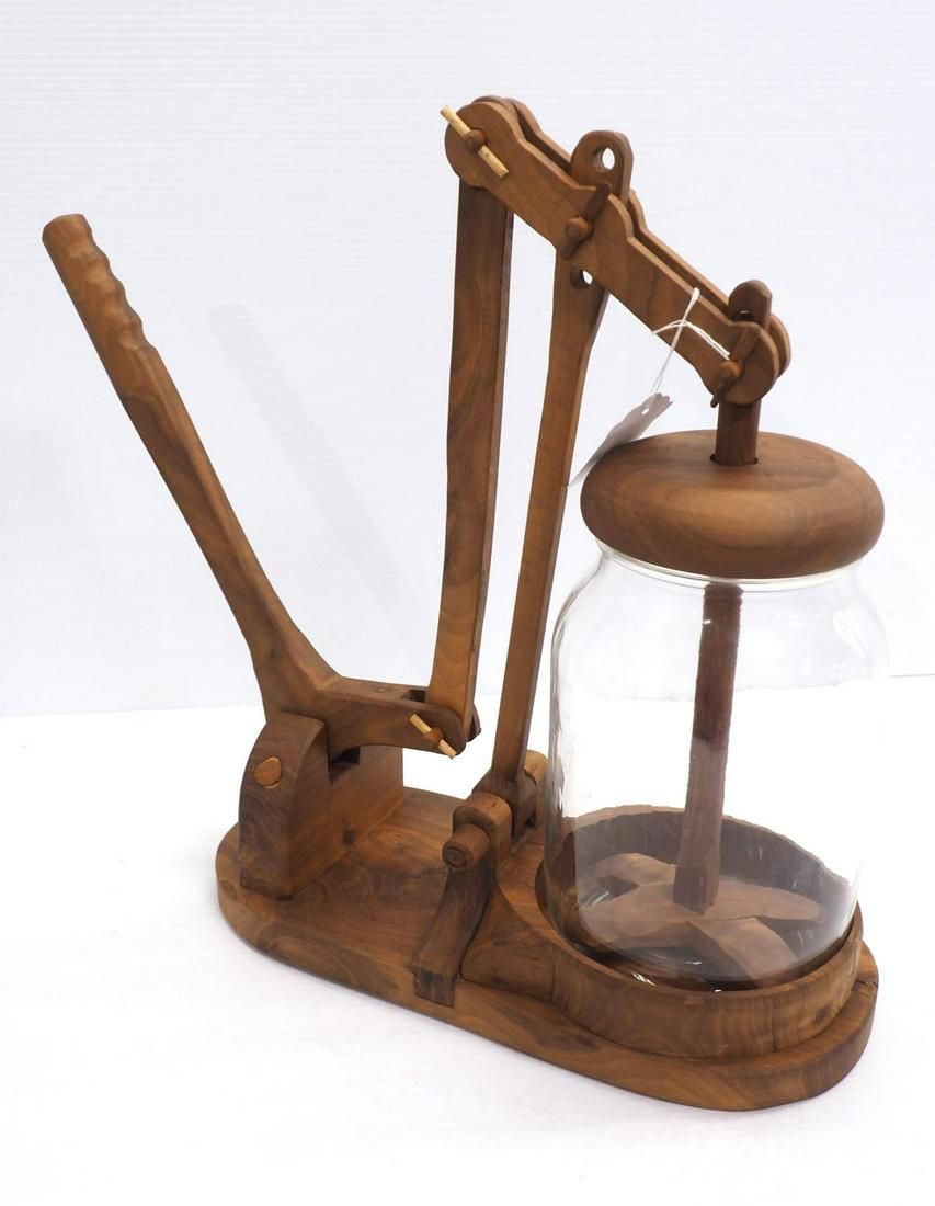 Lot 730: Unusual hand-operated butter churn