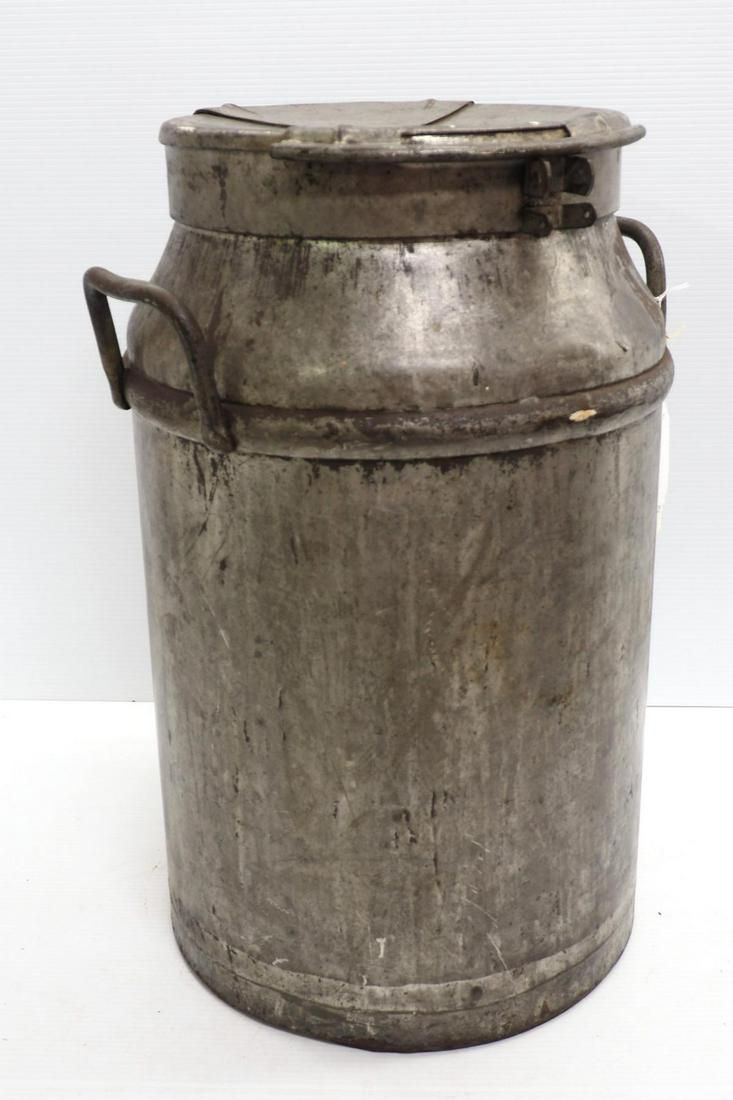 Lot 739: Unmarked milk can used on railroad