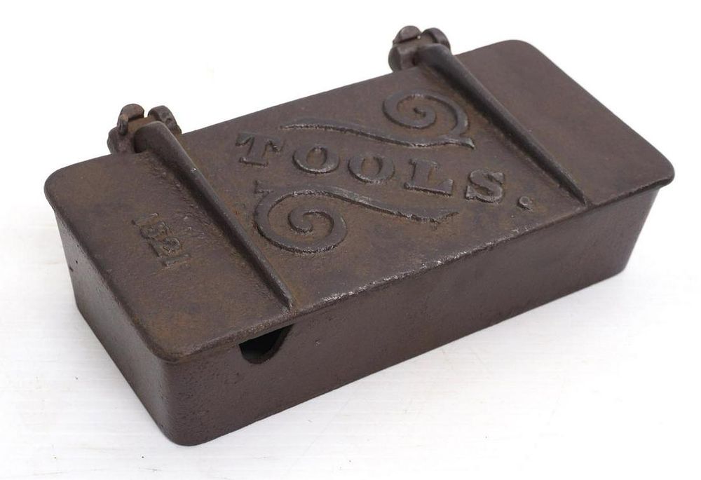 Lot 858: Cast iron Tools tool box