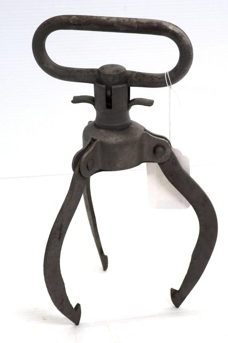 Lot 872: Milk can lid grabber