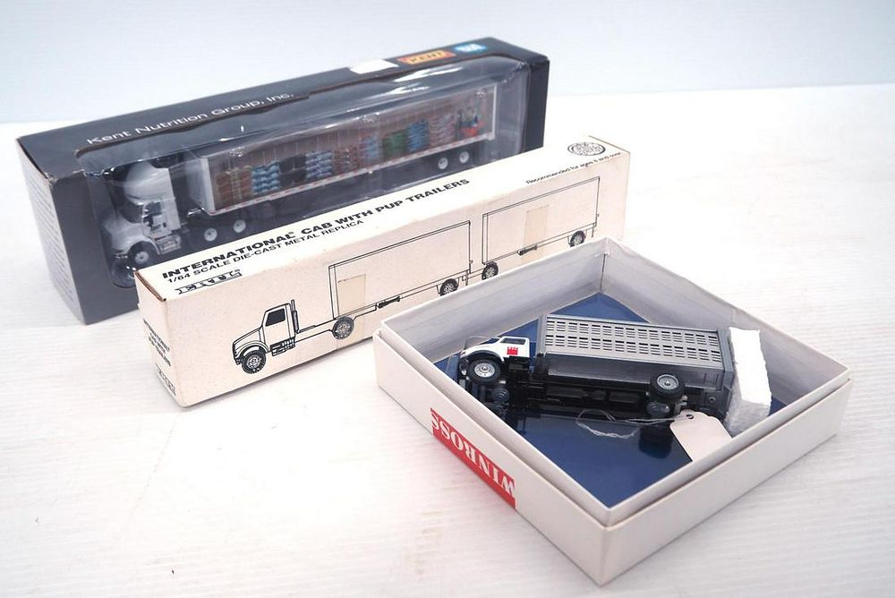 Lot 266: (3) 1/64 scale Trucks
