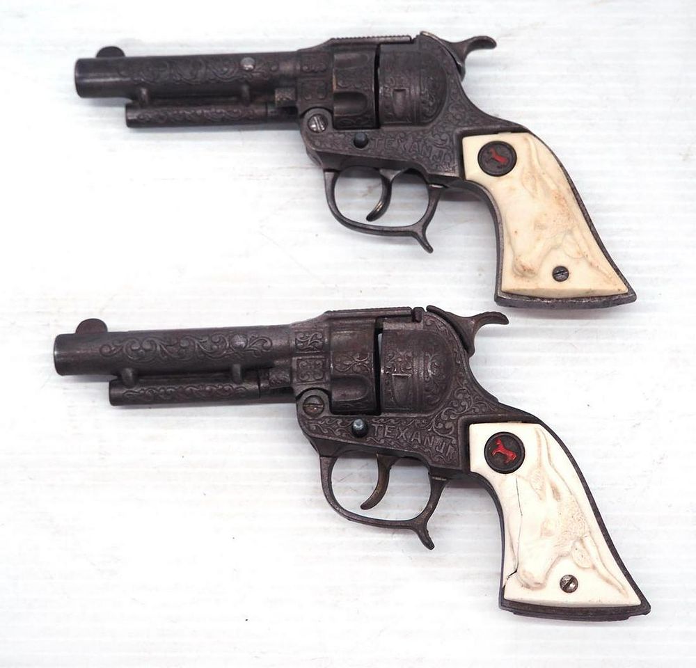Lot 270: (2) Hubley Texan Cast Iron Cap Guns