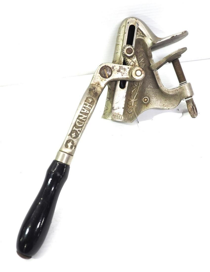 Lot 522: "Handy" clamp-on corkscrew