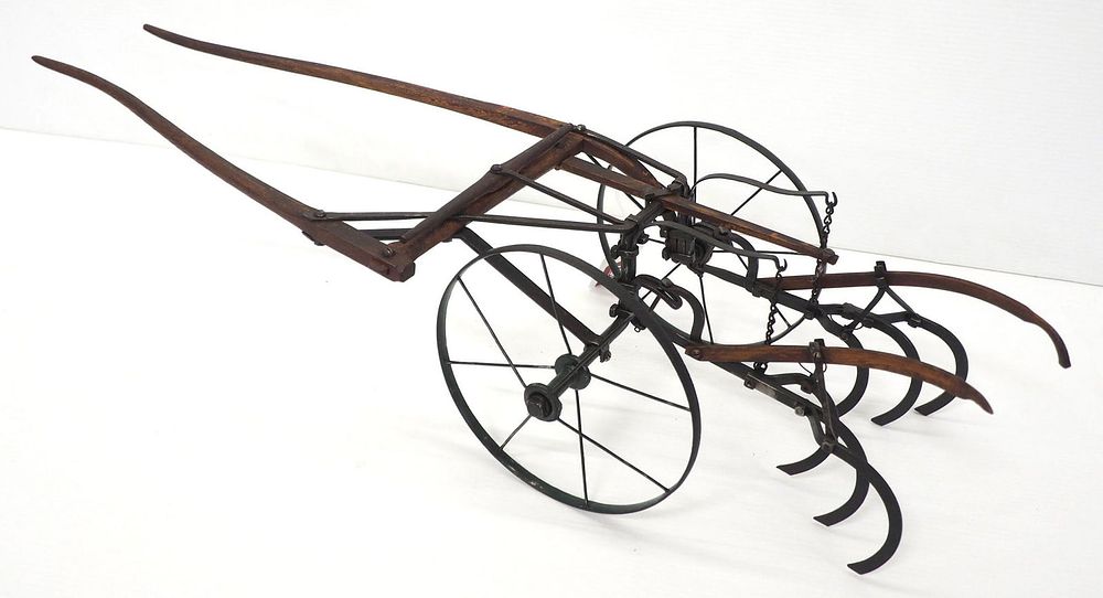 Lot 760: Early salesman sample walk-behind cultivator
