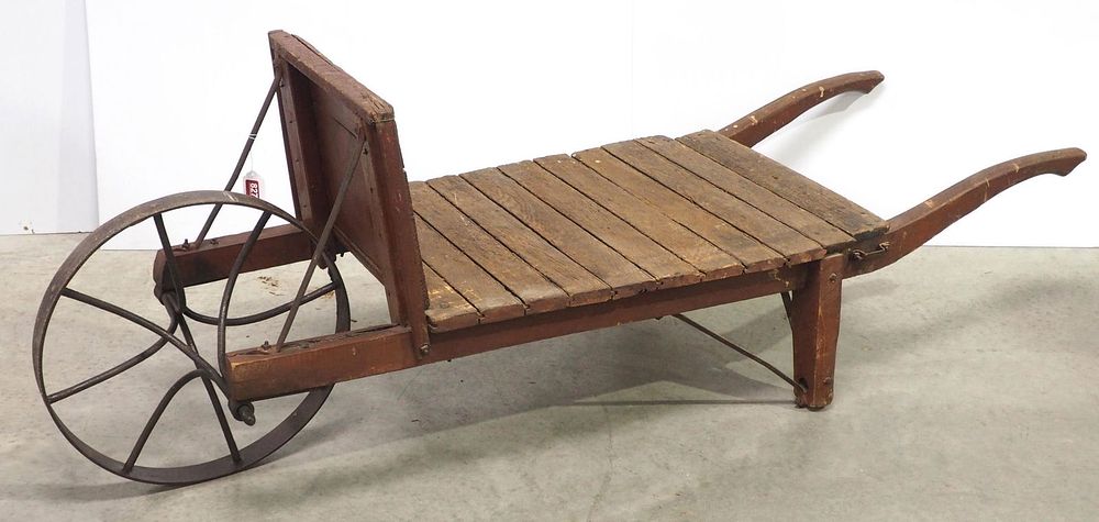 Lot 827: Primitive wheelbarrow with unusual wheel