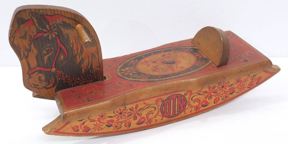 Lot 900: Wooden DTN child's ride-on rocking horse