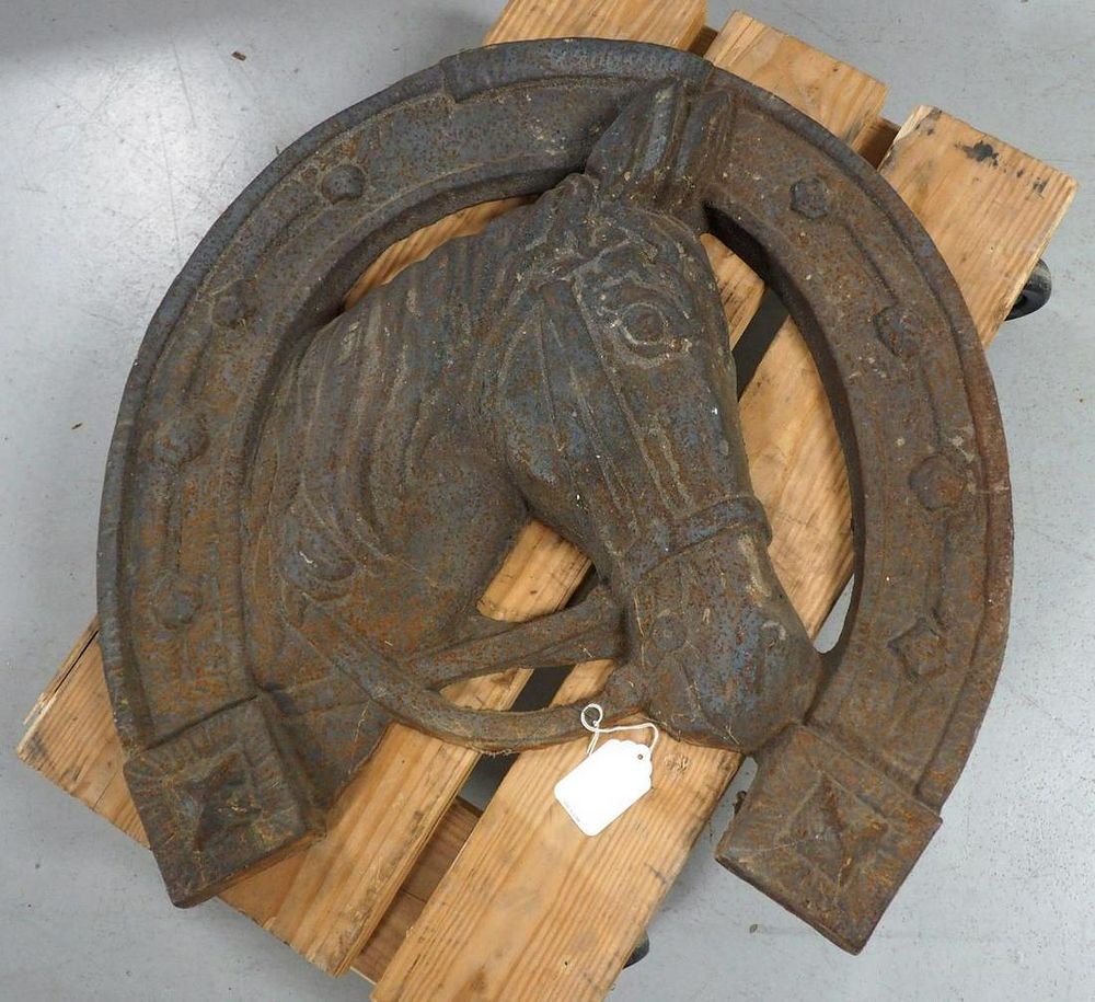 Lot 1148: Cast iron horseshoe trade sign
