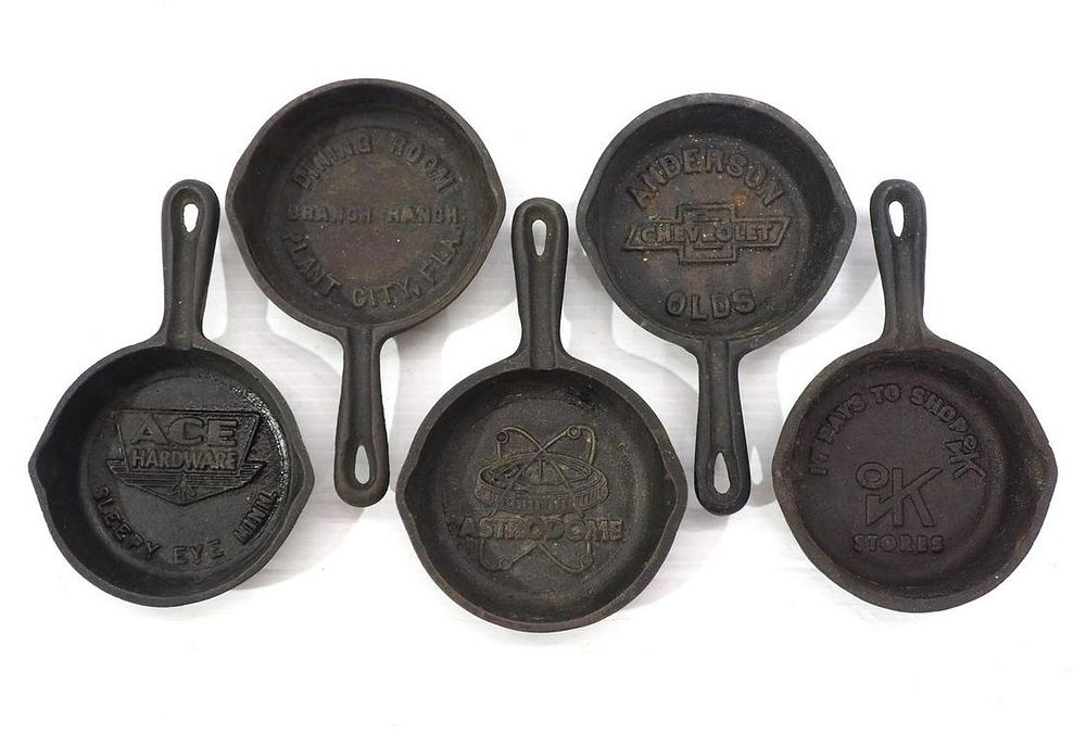 Lot 2527: (5) Small cast iron advertising skillets