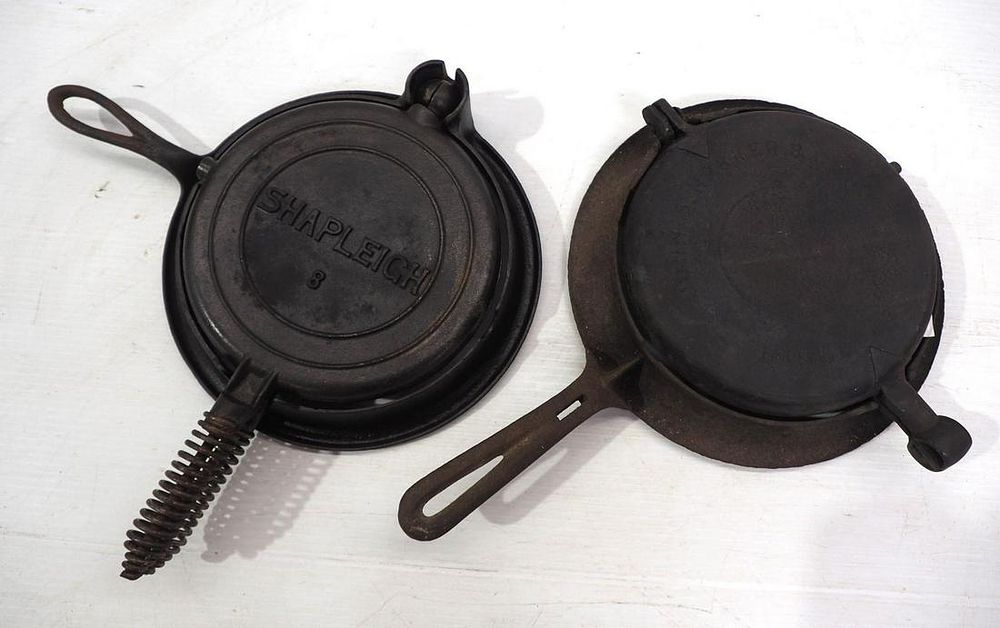 Lot 2721: (2) Cast iron waffle irons