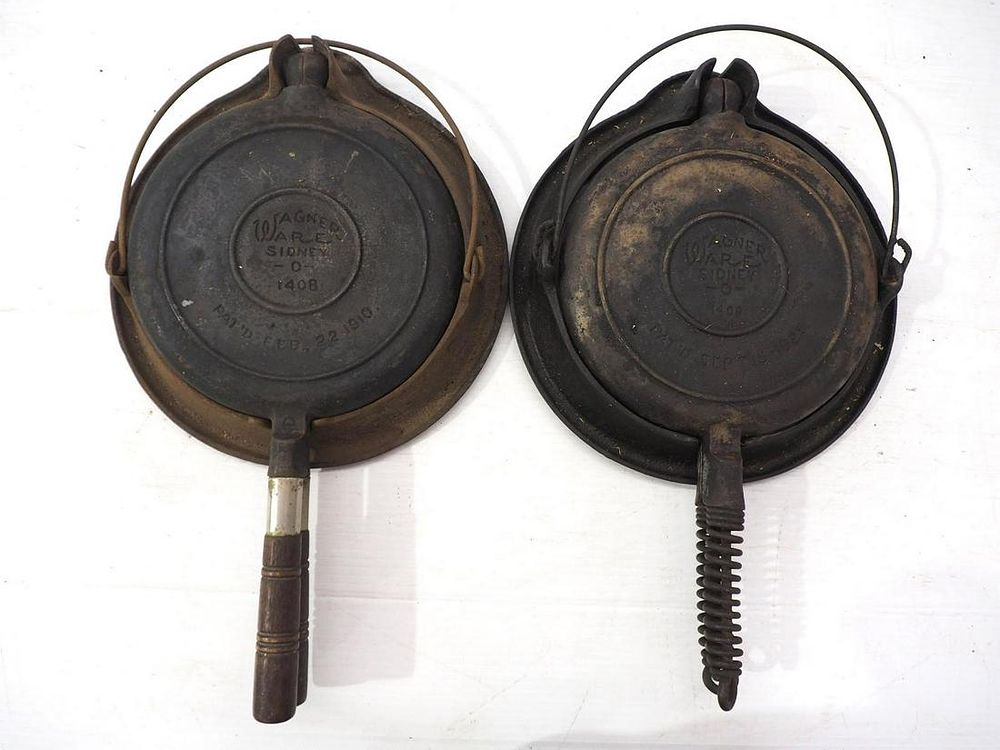 Lot 2742: (2) Wagner cast iron 1408 waffle irons