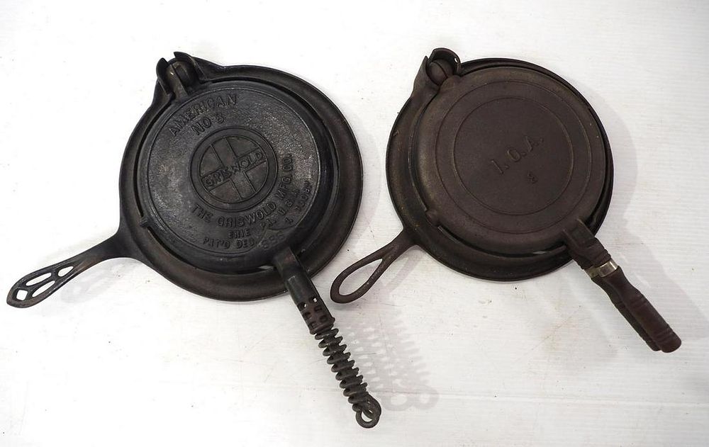 Lot 2746: (2) Cast iron waffle irons