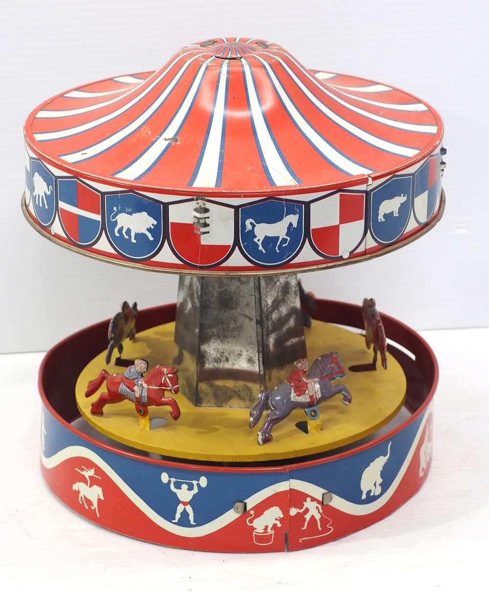 Lot 2074: Mechanical carousel by Wolverine