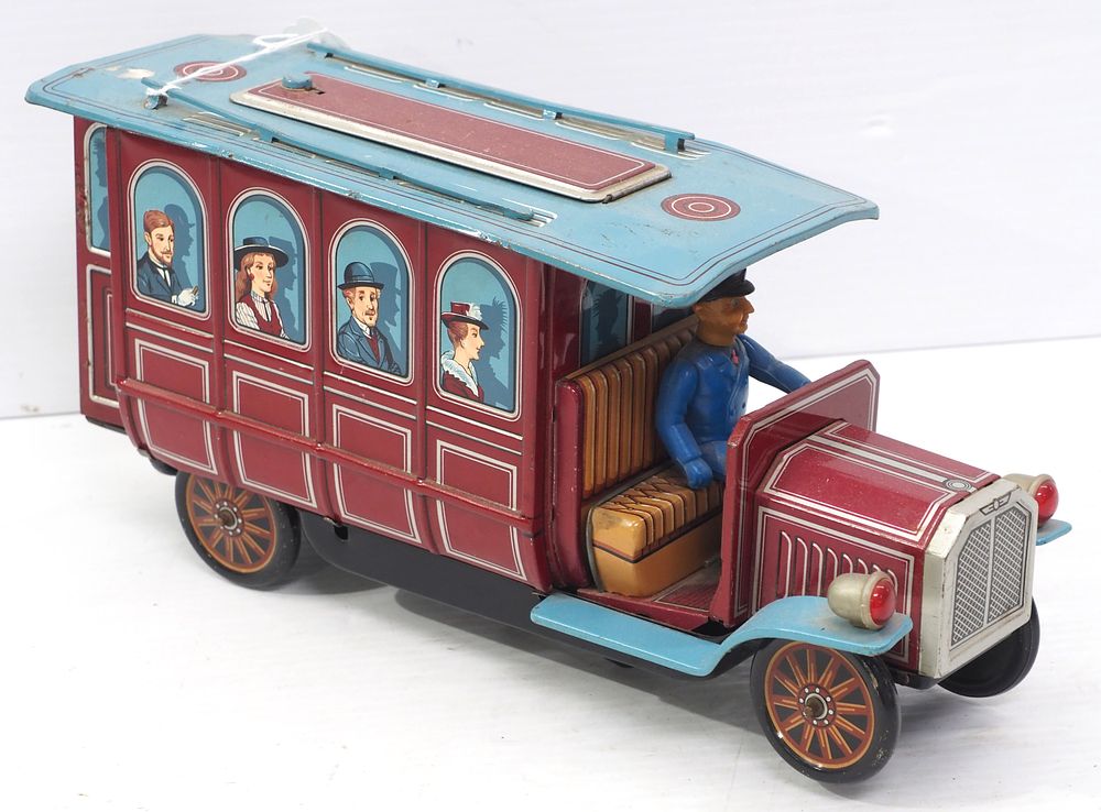 Lot 2079: Tin litho Trolley car with driver