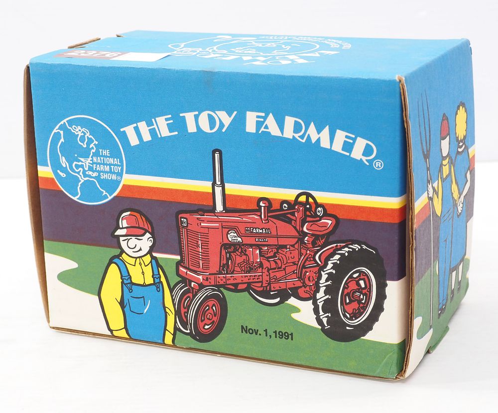 Lot 2376: Ertl Farmall Super M-TA Toy Farmer