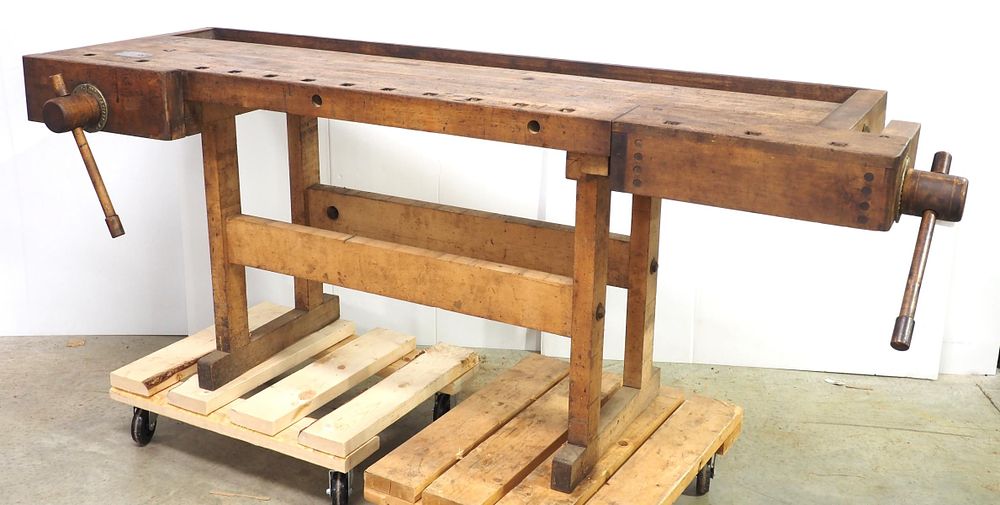 Lot 293: Large wooden work bench with (2) vises