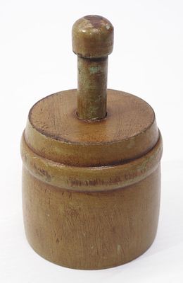 Wooden butter mold with primitive cow design. Wooden butter mold with primitive cow imprint 