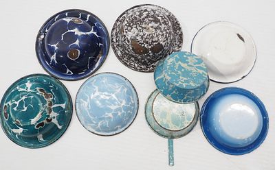 (9) Small granite bowls of different colors, one marked Strong Co., largest one 4.25"dia.