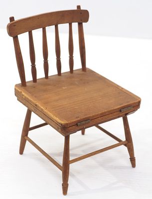 Salesman sample wooden convertible chair. Salesman sample wooden chair that converts to table 