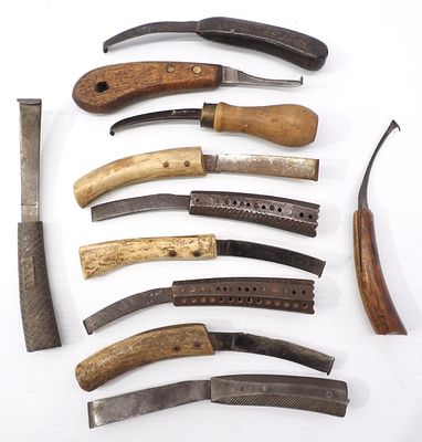 (11) Early hoof knives including some with bone handles, one marked Heller