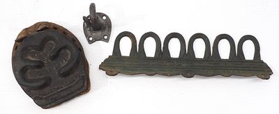 Whip holder / Horseshoe item / broom holder?. 2.5"H horseshoe-shaped whip holder with patent for 