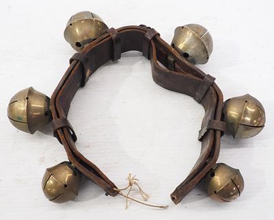 Large leather strap with large brass harness bells, 24"L, largest bell is 3"dia.