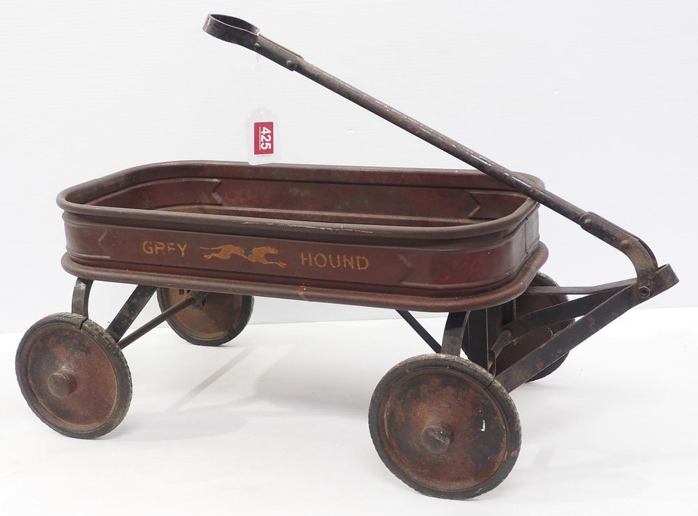 Lot 425: Greyhound metal child's pull wagon