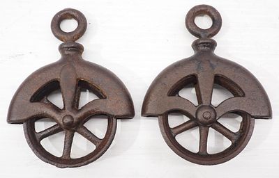 (2) Small cast iron pulleys, 5.5"dia x 4"H