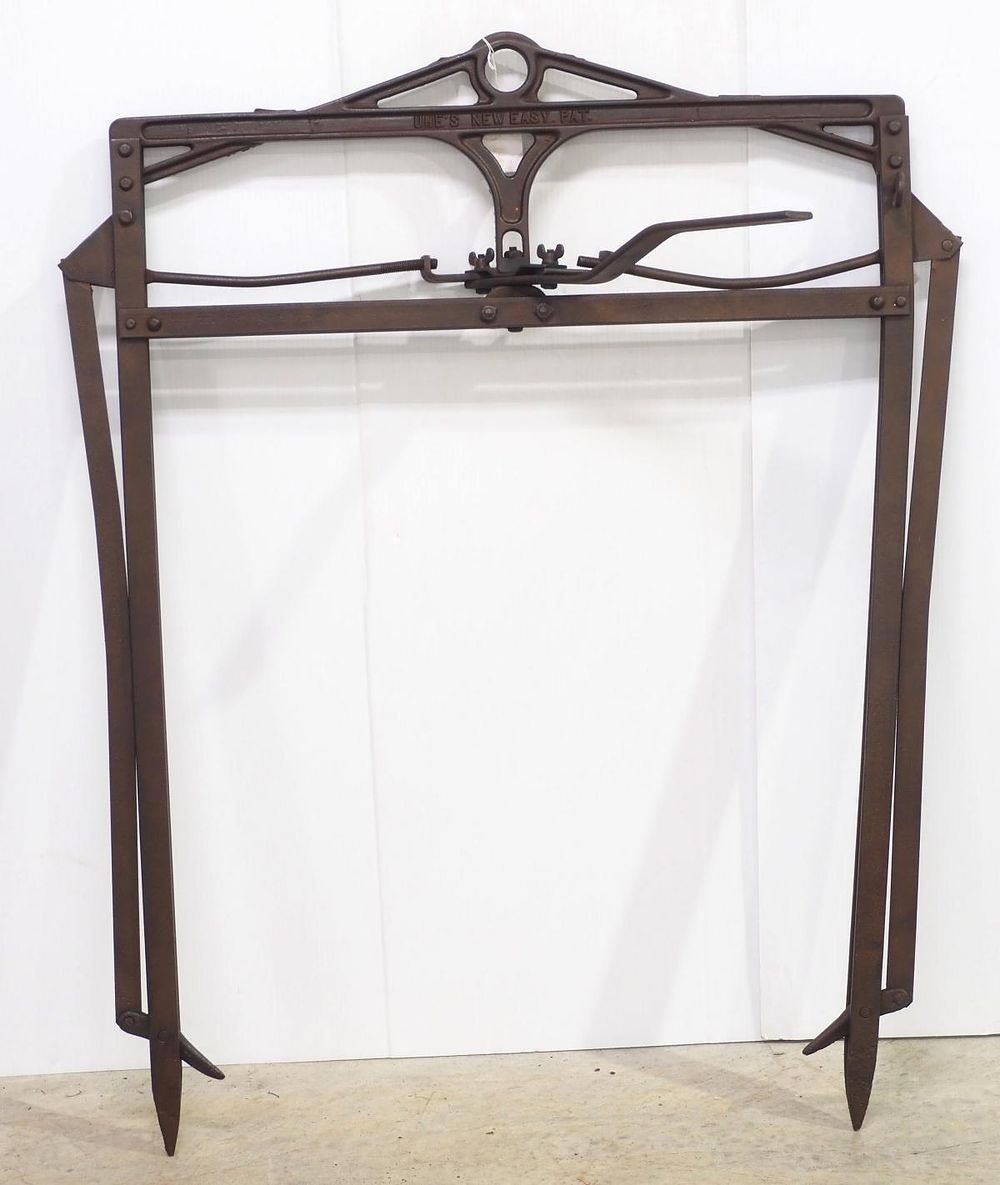 Lot 620: Unusual cast iron hay fork