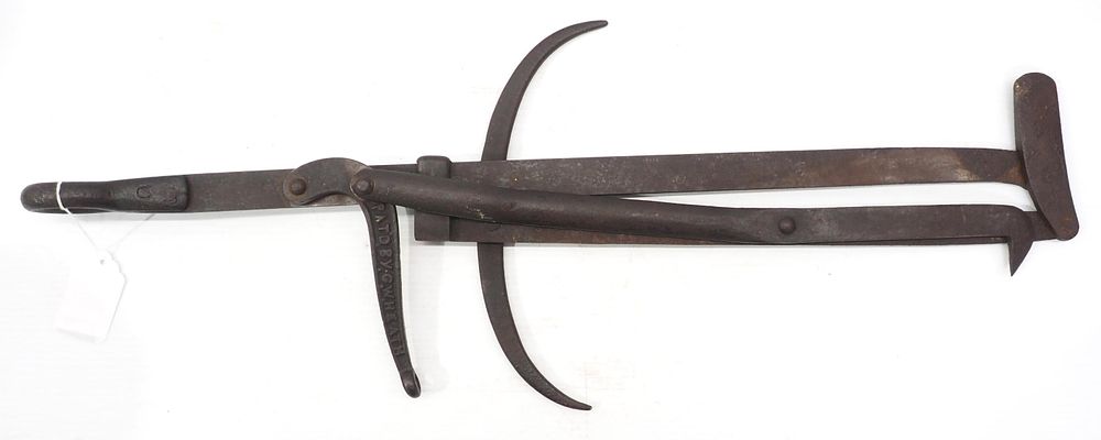 Lot 640: Unusual cast iron hay spear