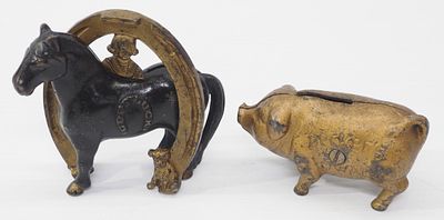 (2) Cast iron animal banks: Good Luck horse with horseshoe, 4.5"H / Decker's Iowana pig, 4.5"L