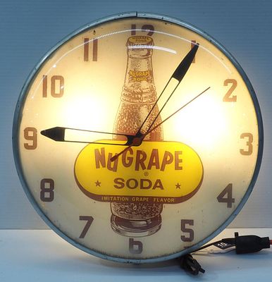 NuGrape Soda lighted clock. 15"dia. glass &amp; metal NuGrape Soda lighted clock by Swihart 