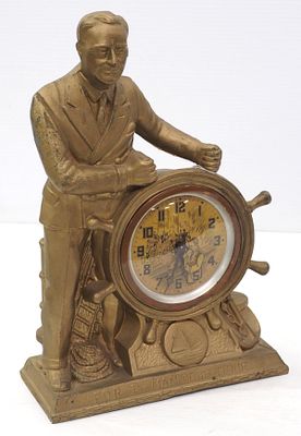 Man of the Hour wind-up desktop clock. FDR Man of the Hour wind-up desktop clock with clock face 