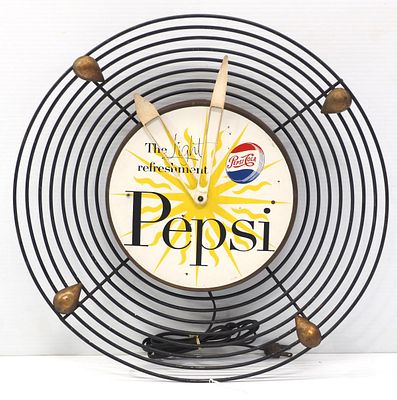 The Light Refreshing Pepsi electric clock. 17"dia. metal The Light Refreshing Pepsi electric 