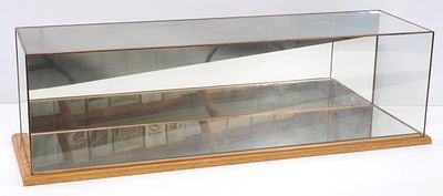 Display case with mirrored bottom. 36"x10" oak and glass display case with mirrored bottom - 