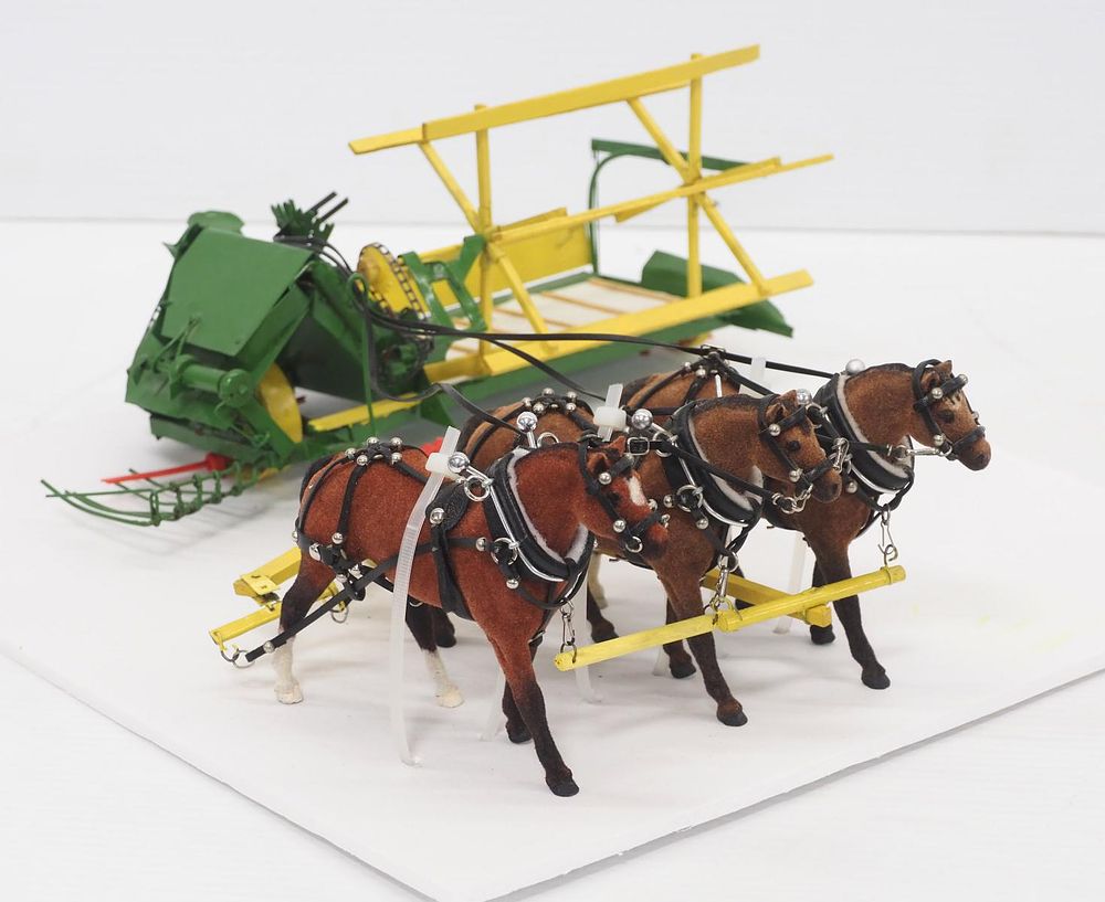 Lot 162: John Deere grain binder with team of 3 small horses