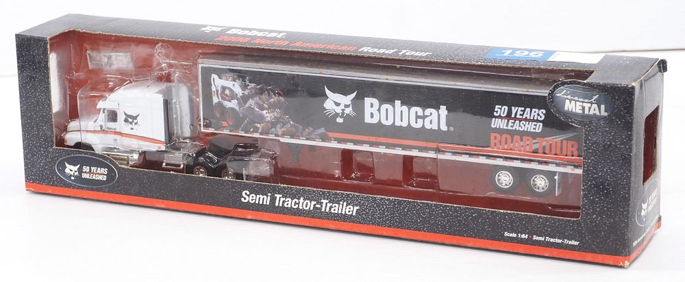 Lot 196: DCP Freightliner and van trailer advertising Bobcat
