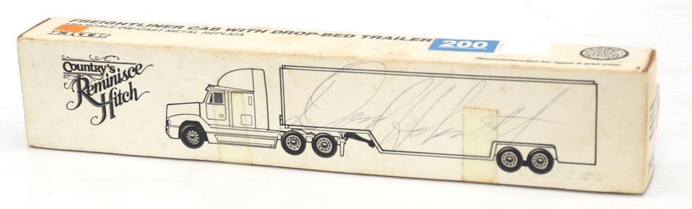 Lot 200: Ertl Freightliner Cab with Drop-Bed Trailer