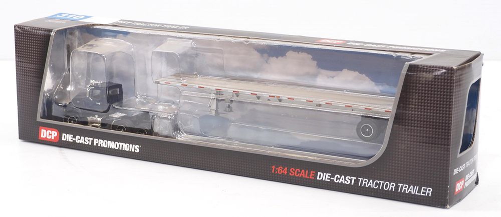 Lot 310: DCP Ford 9000 Truck with 48' Utility Flatbed Trailer