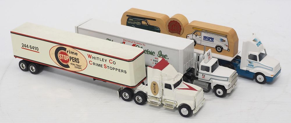 Lot 394: (3) advertising semi trucks with trailer: