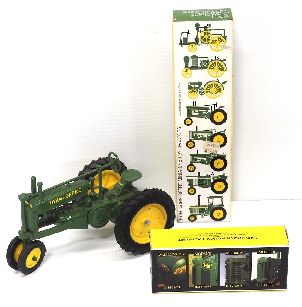 Lot 407: Ertl John Deere A & (12) John Deere miniature tractors