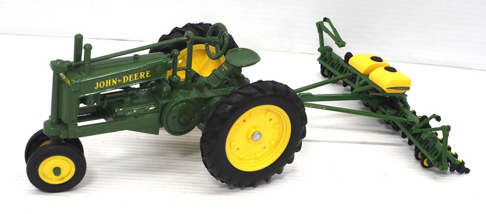 Lot 428: Ertl John Deere tractor and planter