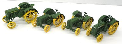 (4) Ertl John Deere tractors. (4) 1/16 scale Ertl John Deere tractors - all VG Condition all VG