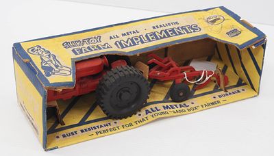 Slik Toy Tractor with 3-bottom plow. 1/16 scale Slik Toy Tractor with 3-bottom plow